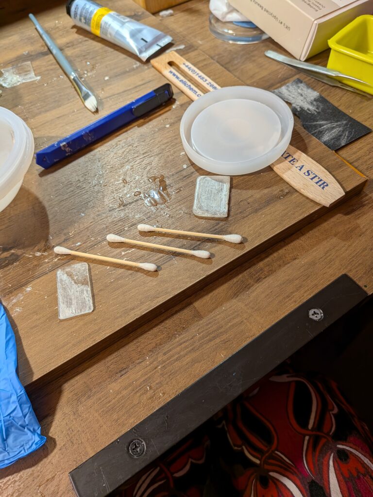 The start of the rigged up cotton  bud screen holder. It sat across the epoxy dome made of tape 